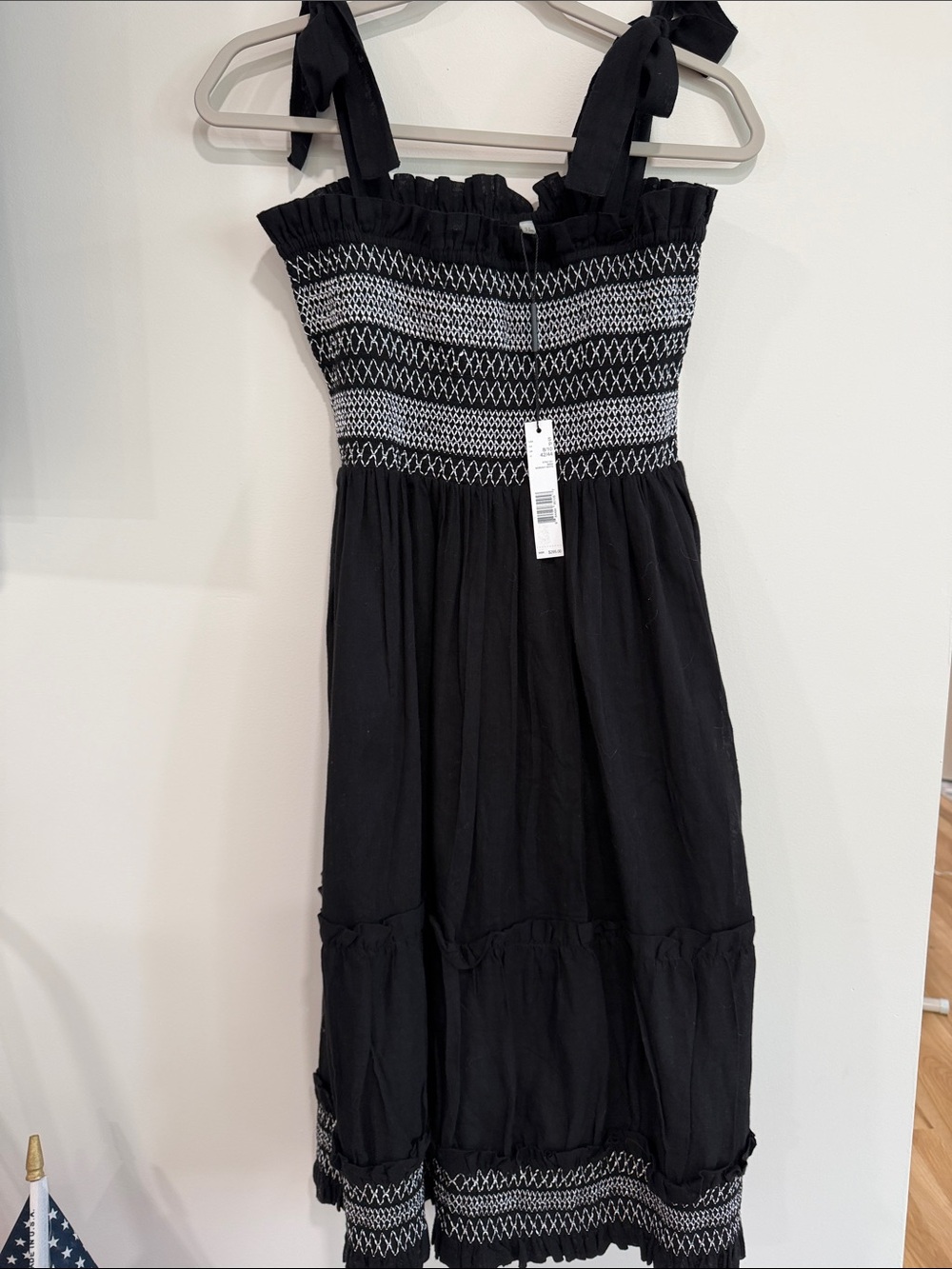 Elie Tahari Black Smocked Top with Silver Logo Plaque